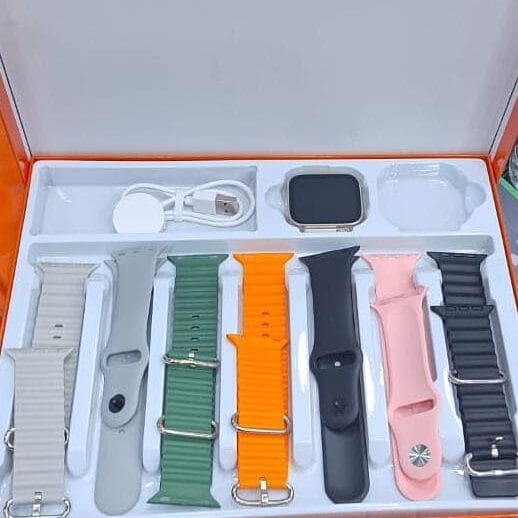 ساعة ذكية 7 في 1 للرجال والنساء مع 7 اساور اضافية عالية الجودة ومينا 49 ملم مع شاحن سريع استمتع مع علبة تيتانيوم للشحن اللاسلكي 49 ملم برتقالي والنساء.