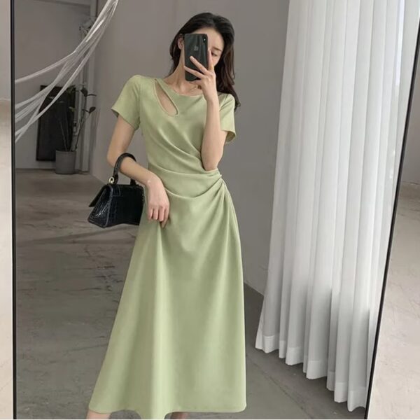 فستان حريمي 2023 صيفي جديد غير رسمي قصة التدريجي تصميم فرنسي نحيف رقبة مستديرة كم قصير تصميم خصر نمط هيبين فستان طويل نسائي